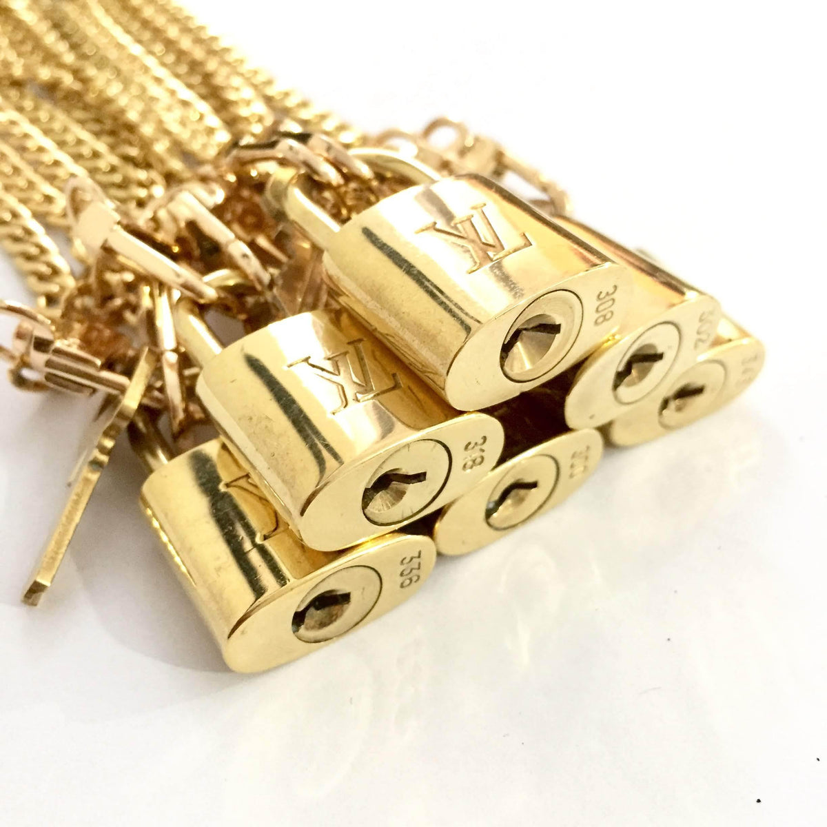 Louis Vuitton Padlock & Key Bag Accessories Charm 10 Piece Set Gold Auction