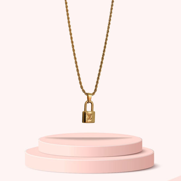 A Louis Vuitton Jeweled Lv Logo Pendant Necklace Auction
