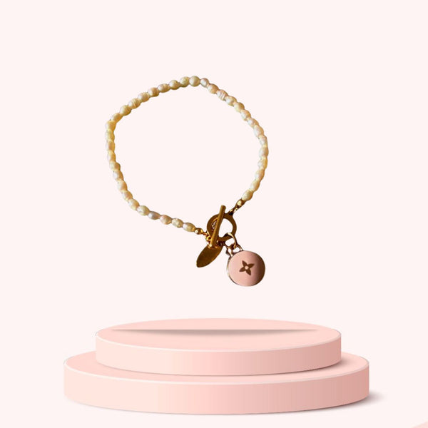 Authentic Louis Vuitton Pastilles Pink Pastel Pendant- Pearls Bracelet