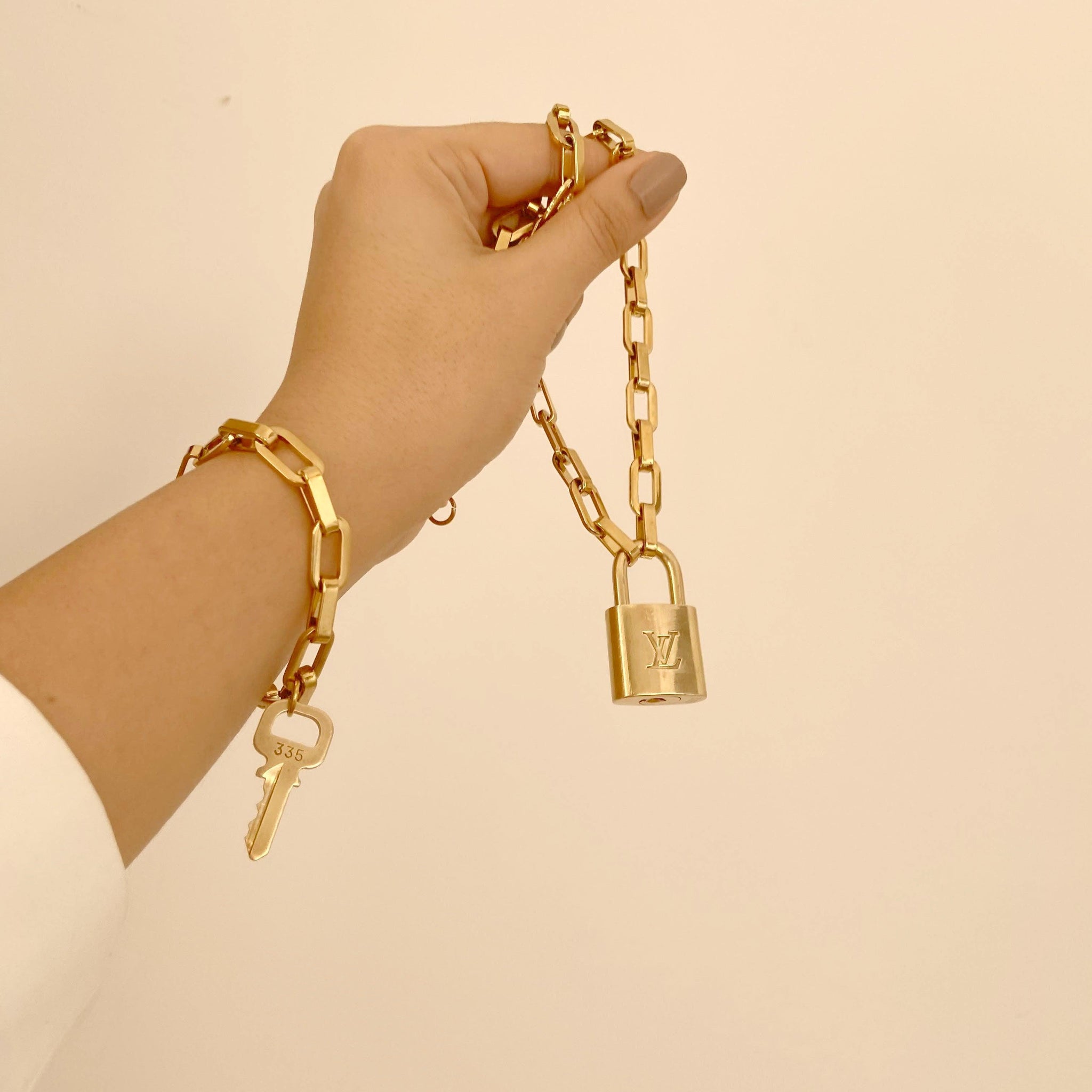 Louis Vuitton Padlock with Geometric Necklace Bracelet Key Set For