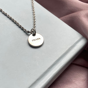 Repurposed Authentic Silver Prada Mini circle tag - Necklace - Boutique SecondLife