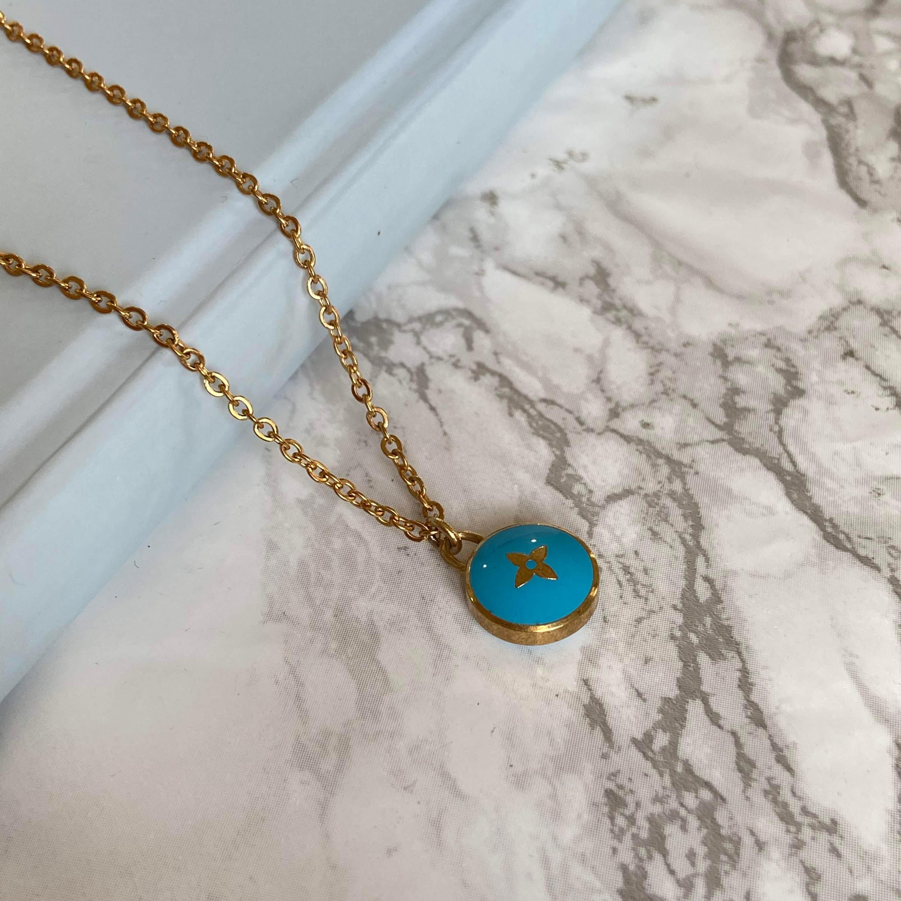 Authentic Louis Vuitton Sapphire Blue Pendant Pastilles – Boutique  SecondLife