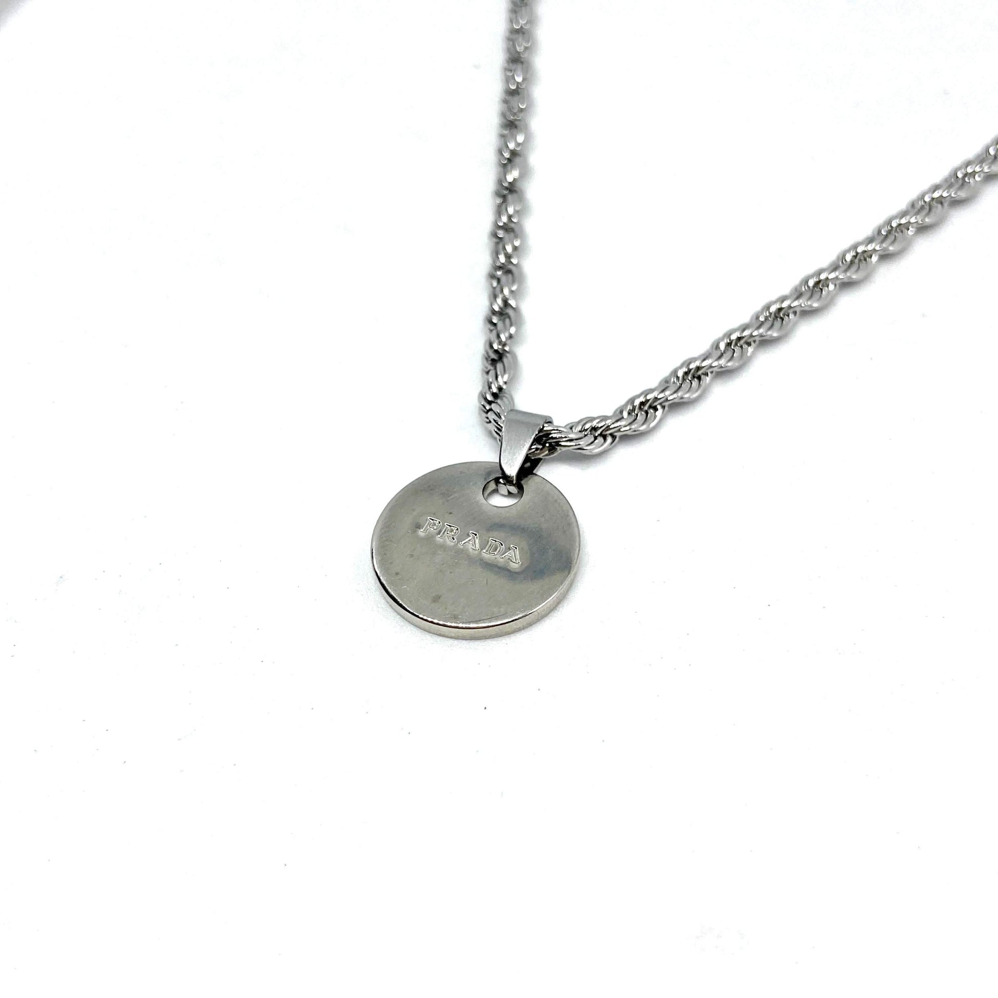 Gift Edition - Repurposed Authentic Silver Prada Mini circle tag - Necklace - Boutique SecondLife