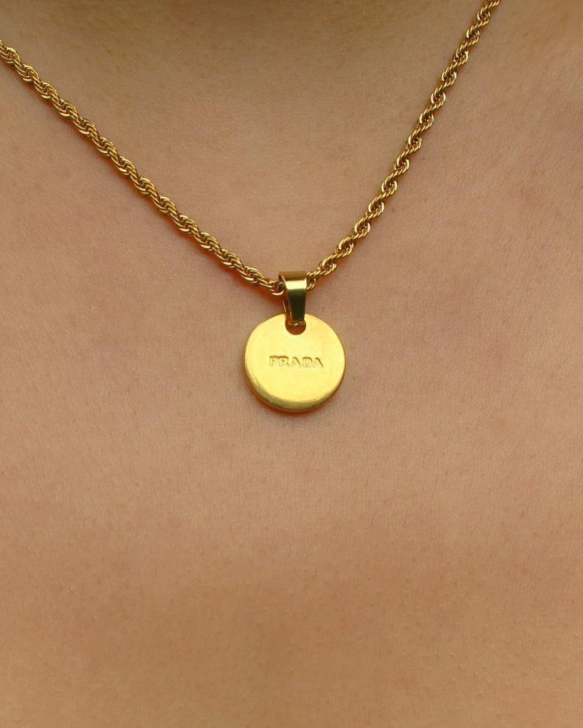 Repurposed Authentic Prada Mini circle tag - Necklace - Boutique SecondLife