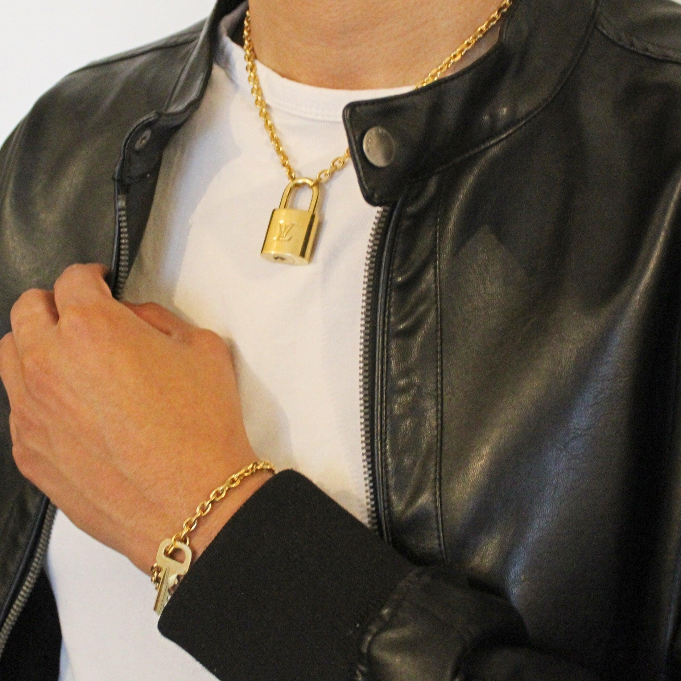 LOUIS VUITTON leather/brass lock necklace | Frankie Jo & Co.