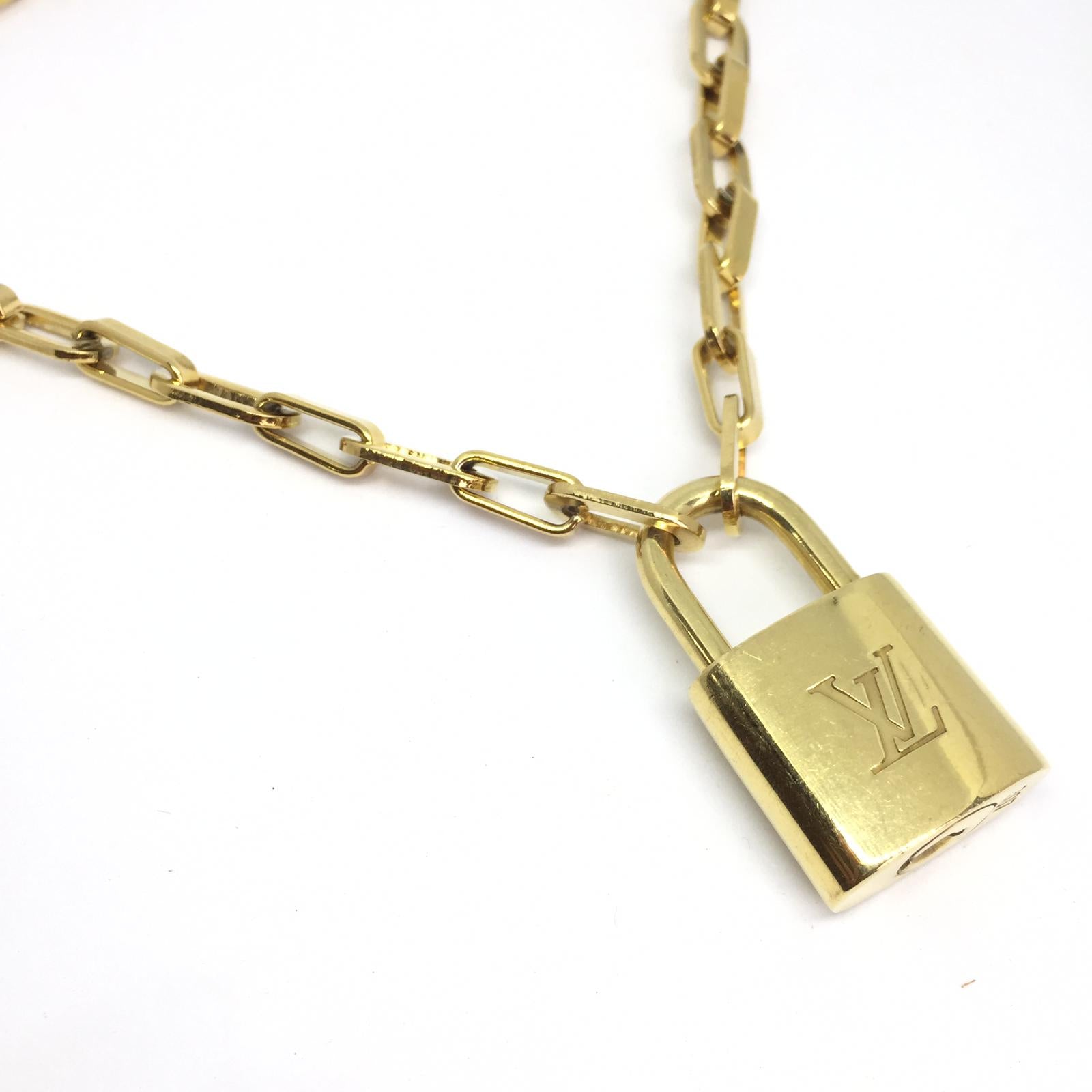Auth Louis Vuitton Padlock Lock and Key #318 includes a non-brand necklace  chain
