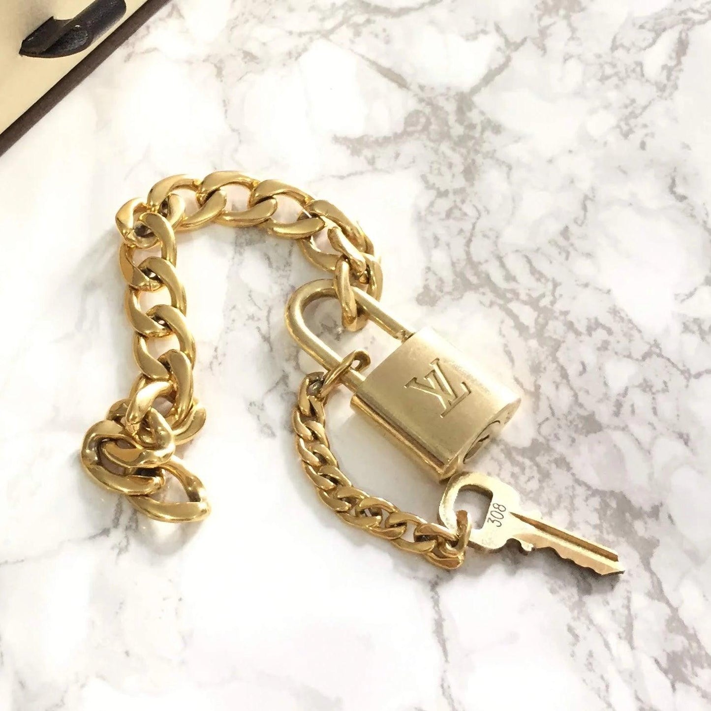 Louis Vuitton Padlock with Bracelet - Boutique SecondLife